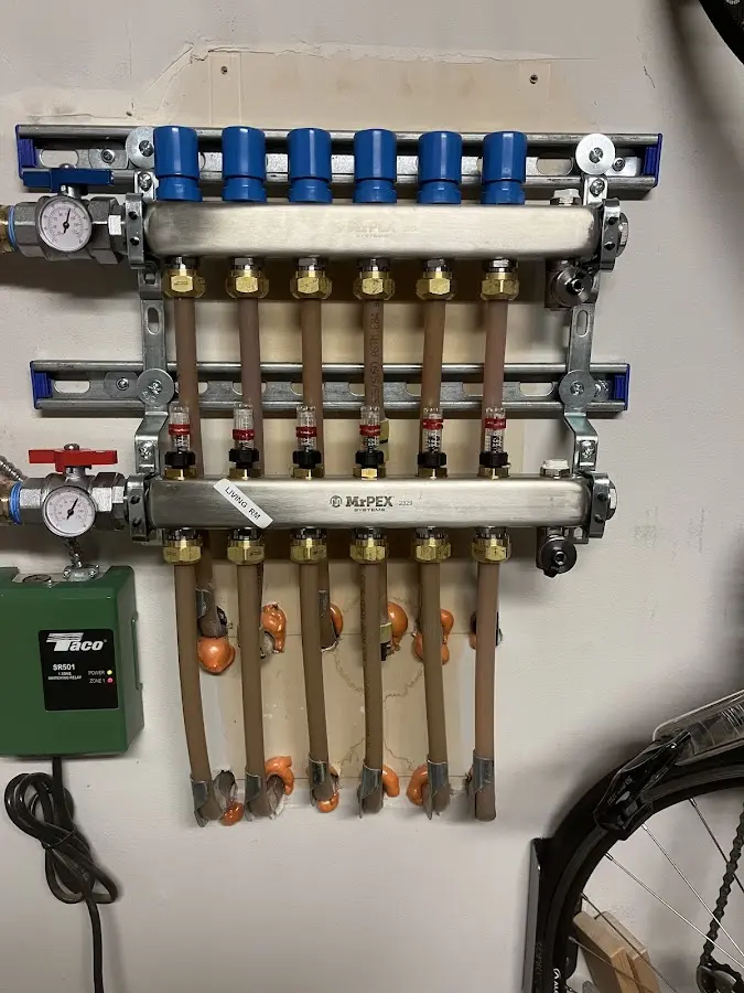 Plumber performing Water Heater Repair at a residential property in Lakewood